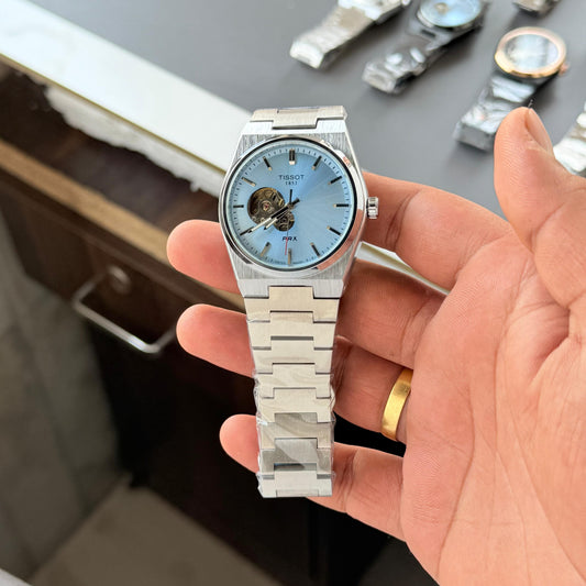 Tissot PRX Automatic Sky Blue                        (Open Heart )